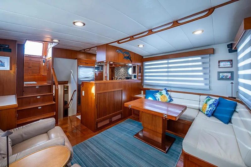 Slide: The Image of Luxurious 2008 Kadey-Krogen 44 yacht interior with elegant wood finishes and cozy seating area. - 6