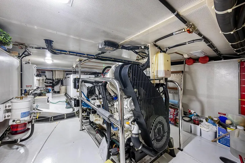 Slide: The Image of Engine room of a 2008 Kadey-Krogen 44 yacht, showcasing machinery and equipment. - 64