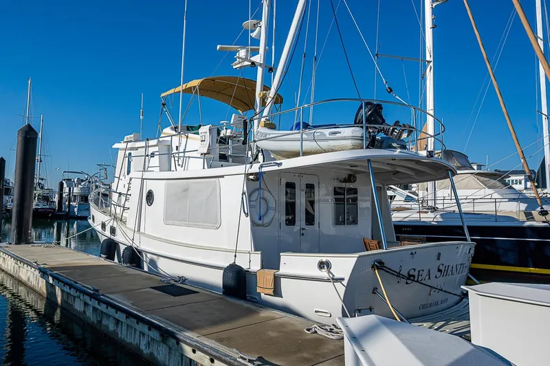 Slide: The Image of Kadey-Krogen 44 yacht, 2008 model, docked at marina under clear blue sky. - 72