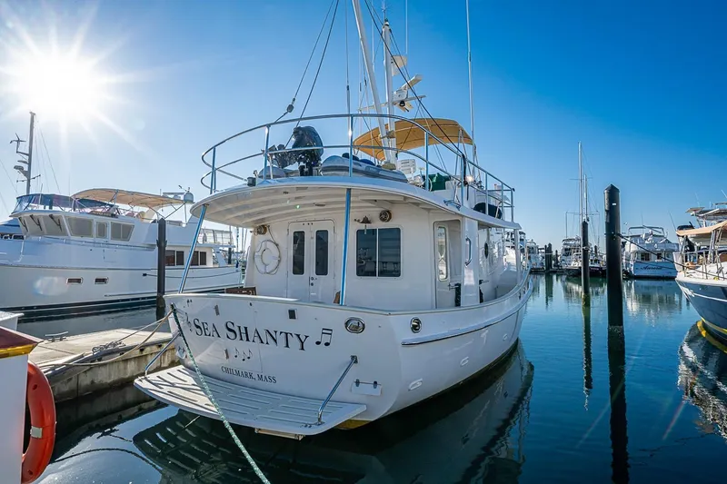 Slide: The Image of Kadey-Krogen 44 yacht, 2008 model, docked in a sunny marina. - 74