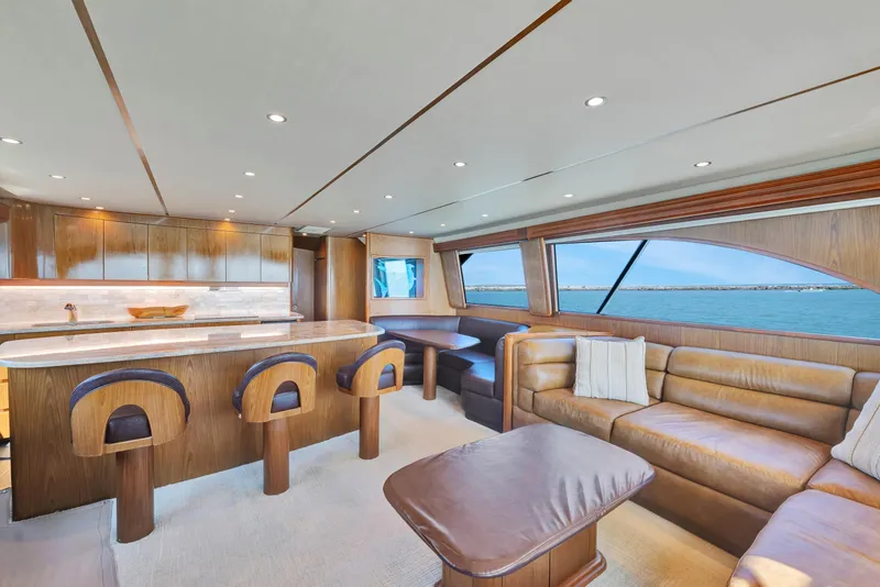 Slide: The Image of Luxurious interior of 2011 Viking 70 Convertible yacht with leather seating and ocean view. - 2