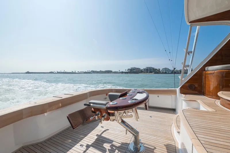 Slide: The Image of 2011 Viking 70 Convertible yacht deck with fishing chair, ocean view. - 30