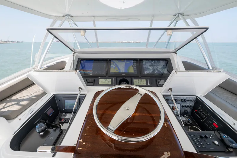 Slide: The Image of Outdoor grill on 2011 Viking 70 Convertible yacht with polished wood finish. - 35