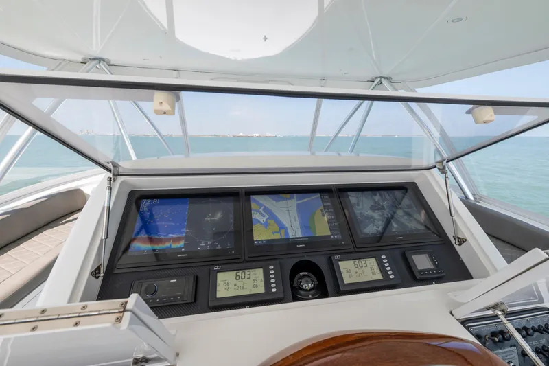 Slide: The Image of Outdoor grill on 2011 Viking 70 Convertible yacht with polished wood finish. - 36