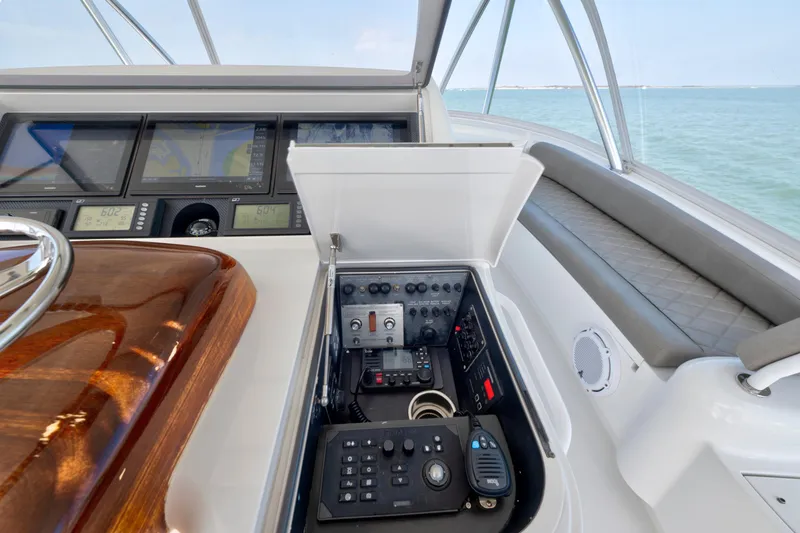 Slide: The Image of Cockpit of 2011 Viking 70 Convertible yacht with advanced navigation systems. - 38