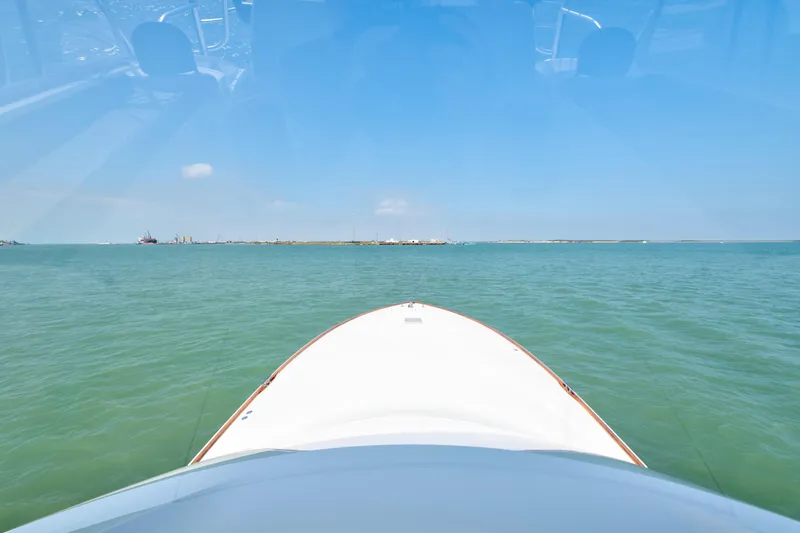 Slide: The Image of Control panel of 2011 Viking 70 Convertible yacht with navigation equipment. - 40