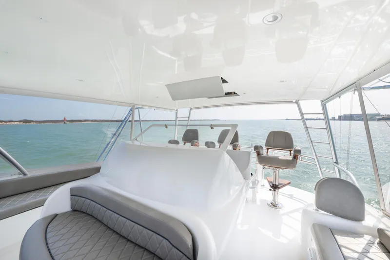 Slide: The Image of Luxurious interior of 2011 Viking 70 Convertible yacht with ocean view. - 42