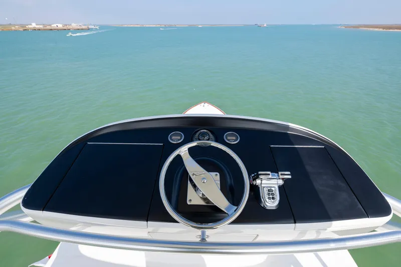 Slide: The Image of Luxurious interior of 2011 Viking 70 Convertible yacht with ocean view. - 44