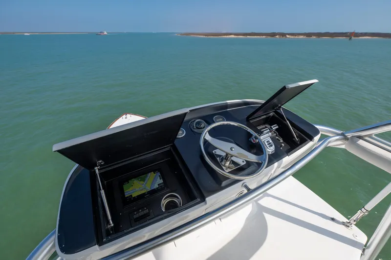 Slide: The Image of Luxurious 2011 Viking 70 Convertible yacht interior with ocean view and modern seating. - 46