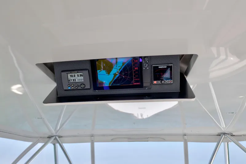 Slide: The Image of Aerial view of 2011 Viking 70 Convertible yacht cruising on green water. - 50