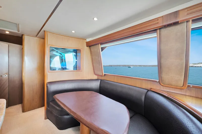 Slide: The Image of Luxurious interior of 2011 Viking 70 Convertible yacht with ocean view. - 6