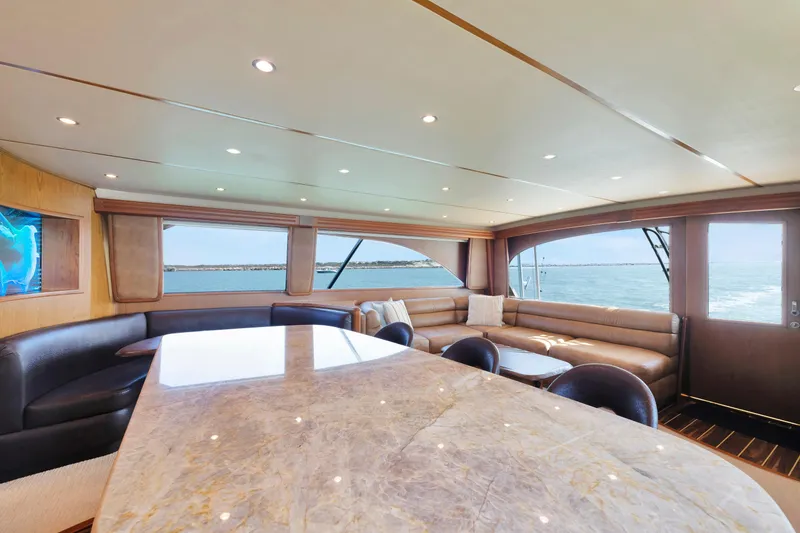 Slide: The Image of Luxurious interior of 2011 Viking 70 Convertible yacht with ocean view. - 7