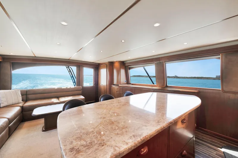 Slide: The Image of Luxurious interior of 2011 Viking 70 Convertible yacht with ocean view. - 8