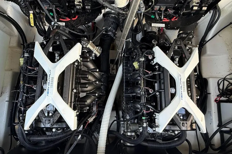Slide: The Image of 2024 Yamaha Boats 252SE engine compartment showcasing dual high-output engines. - 16