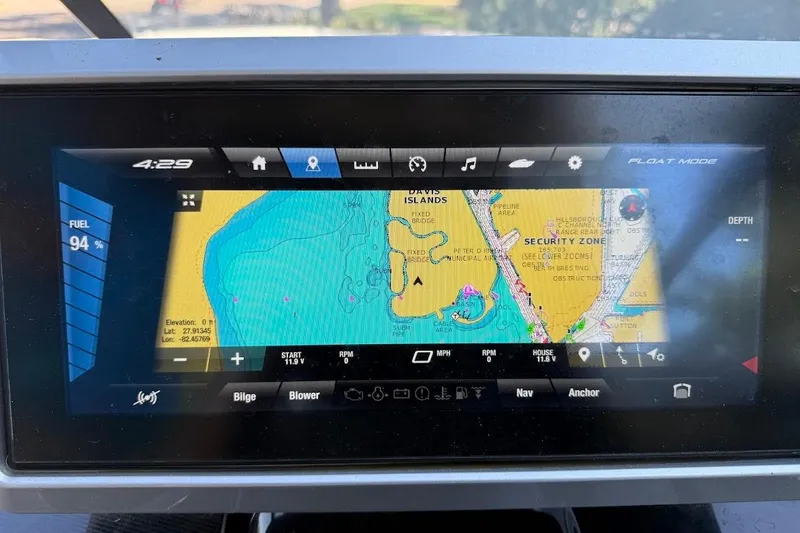 Slide: The Image of Dashboard of 2024 Yamaha Boats 252SE showing navigation map and fuel level. - 21