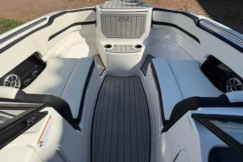 Slide: The Image of 2024 Yamaha Boats 252SE interior with sleek seating and modern design. - 7