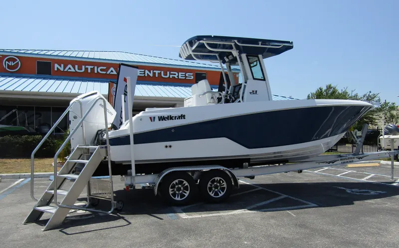 Slide: The Image of 2024 Wellcraft 243 Fisherman boat on a trailer at Nautical Ventures. - 3