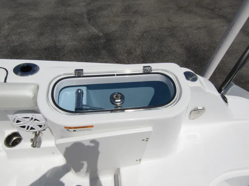 Slide: The Image of Livewell on 2024 Wellcraft 243 Fisherman boat, featuring a sleek design and modern amenities. - 32