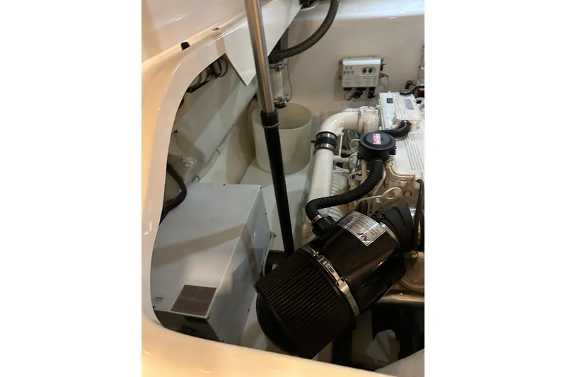 Slide: The Image of Engine compartment of 2014 Tiara Yachts 4300 Open, showcasing mechanical components. - 31