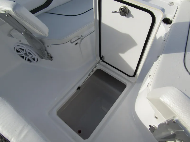 Slide: The Image of 2025 Wellcraft 243 Fisherman boat interior storage compartment. - 15