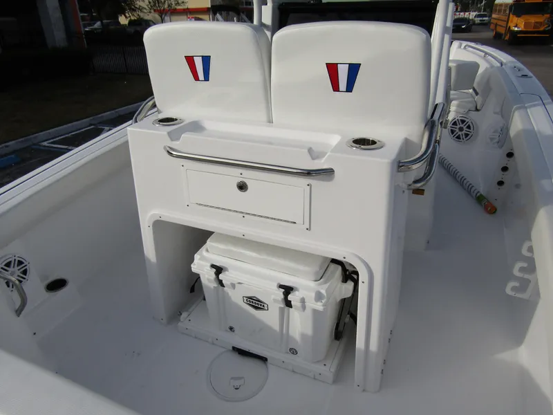 Slide: The Image of 2025 Wellcraft 243 Fisherman boat interior with seating and storage area. - 32