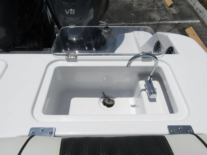 Slide: The Image of 2024 Wellcraft 352 Fisherman boat sink and faucet setup. - 41