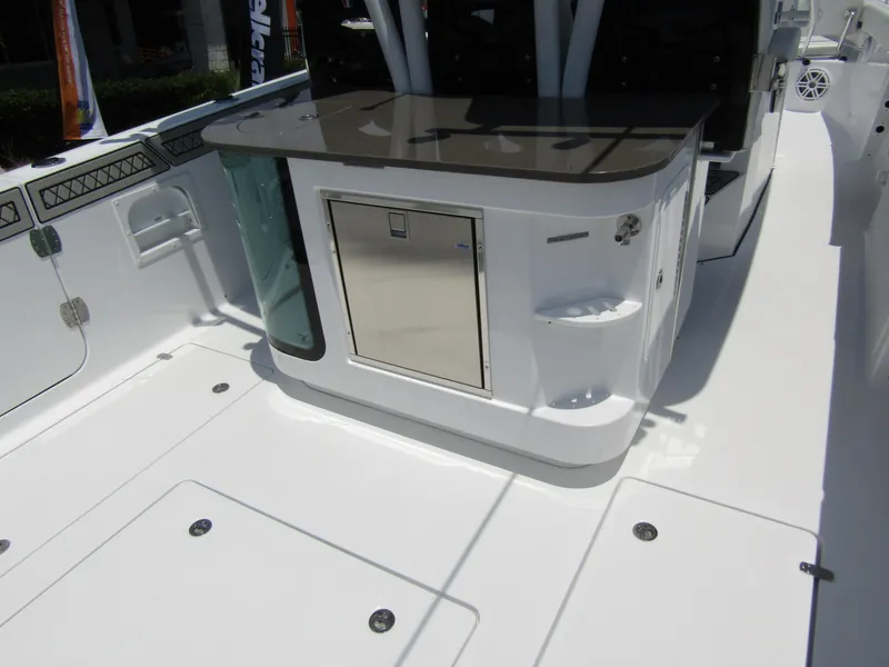 Slide: The Image of 2024 Wellcraft 352 Fisherman boat interior with storage and counter space. - 35