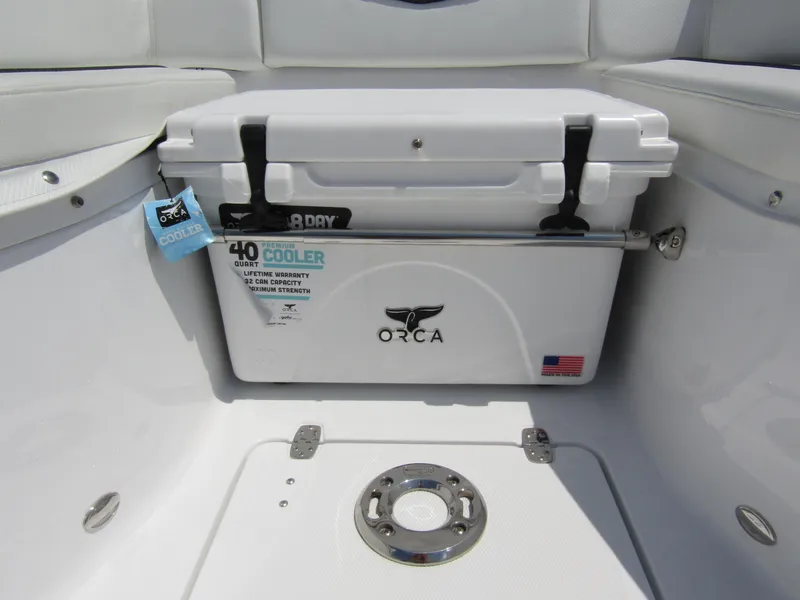 Slide: The Image of 2024 Wellcraft 352 Fisherman boat with ORCA cooler in storage compartment. - 8