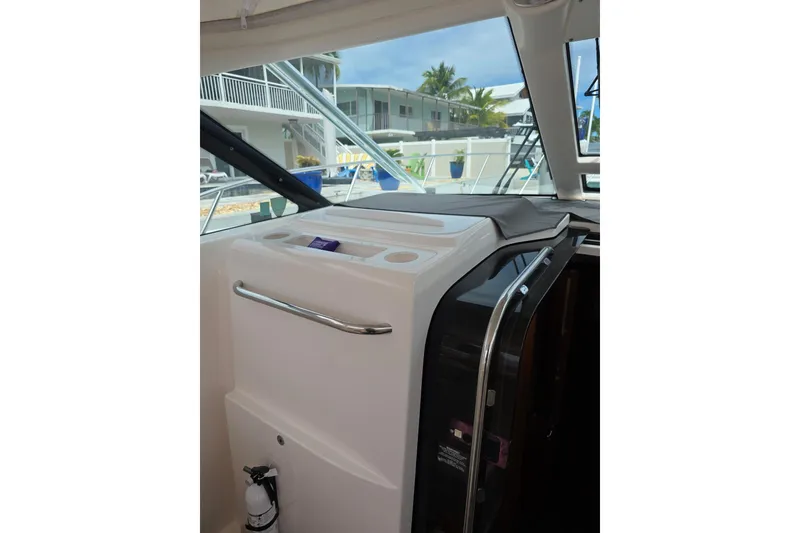 Slide: The Image of Interior view of 2006 Tiara Yachts 3600 Open, showcasing helm area and window. - 15