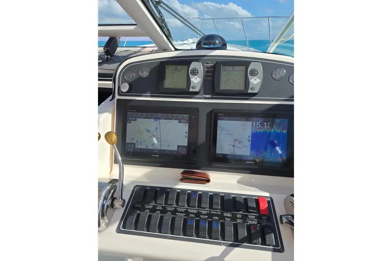 Slide: The Image of 2006 Tiara Yachts 3600 Open dashboard with navigation and control panels. - 18