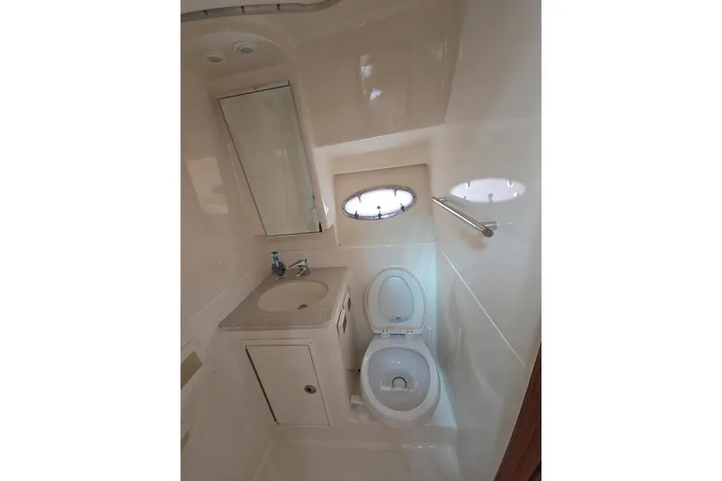 Slide: The Image of Bathroom interior of 2006 Tiara Yachts 3600 Open, featuring sink and toilet. - 35