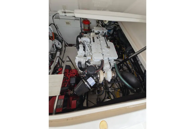 Slide: The Image of Engine compartment of a 2006 Tiara Yachts 3600 Open, showcasing detailed mechanical components. - 39