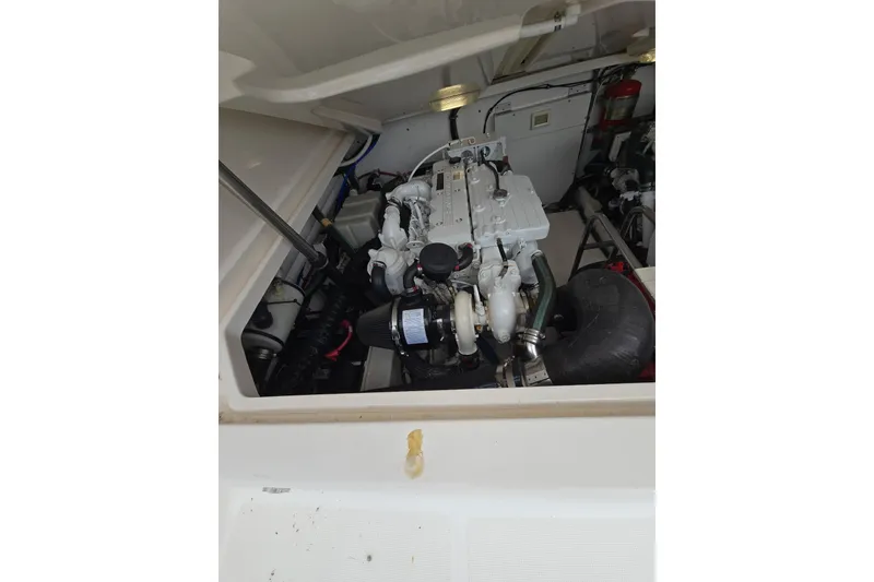 Slide: The Image of Engine compartment of 2006 Tiara Yachts 3600 Open, showcasing detailed mechanical components. - 40