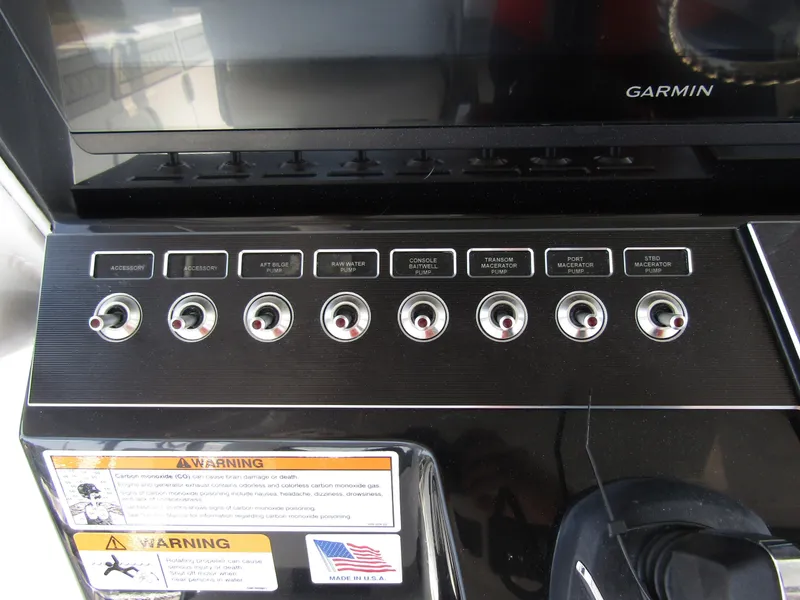 Slide: The Image of Control panel of 2024 Wellcraft 352 Fisherman boat with Garmin display. - 22