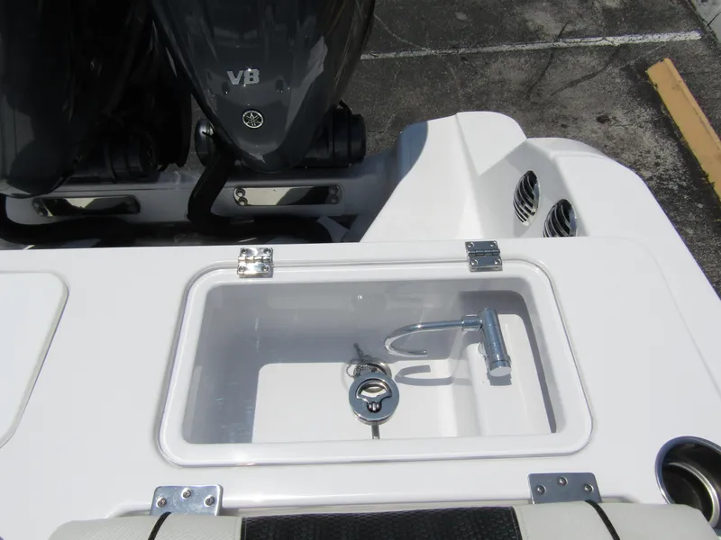 Slide: The Image of 2024 Wellcraft 352 Fisherman boat with dual outboard engines and livewell. - 40