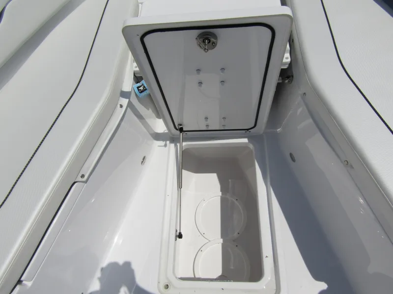 Slide: The Image of 2024 Wellcraft 352 Fisherman storage compartment with open hatch. - 9