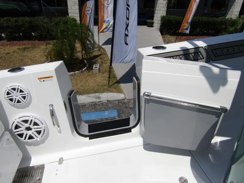 Slide: The Image of 2024 Wellcraft 352 Fisherman boat deck with open side door and speakers. - 33