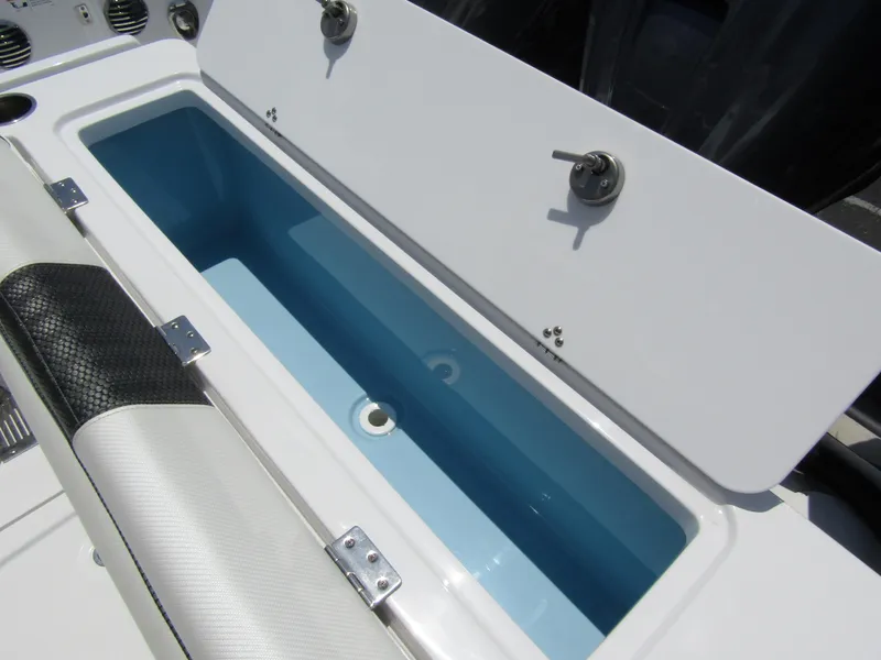 Slide: The Image of 2024 Wellcraft 352 Fisherman boat livewell compartment with open lid. - 43