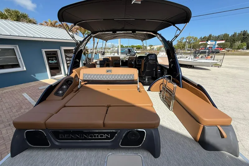 Slide: The Image of 2026 Bennington QX 30 QXSBA X2 Wide Beam boat with luxurious seating and modern design. - 4