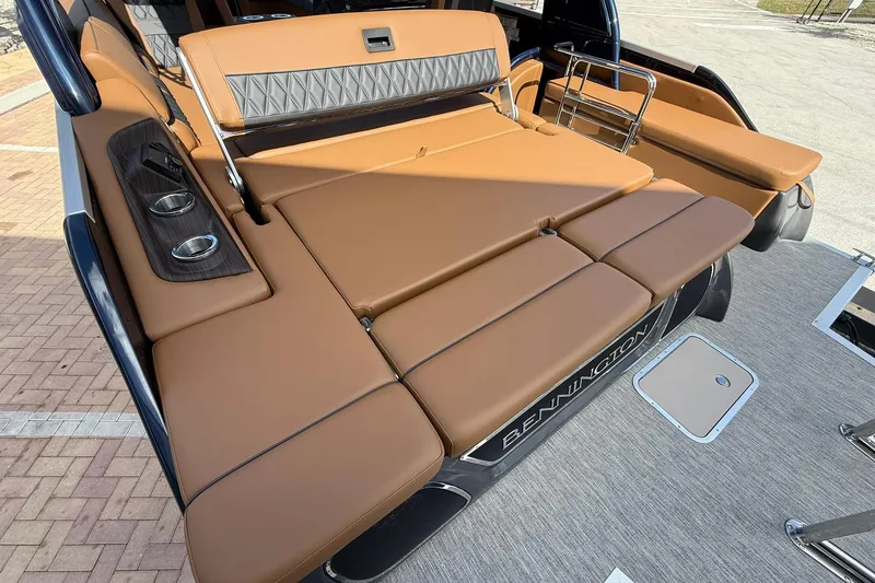Slide: The Image of 2026 Bennington QX 30 QXSBA X2 Wide Beam boat with luxurious tan seating. - 6