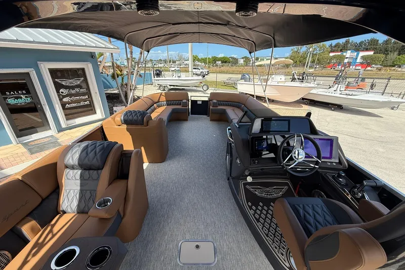 Slide: The Image of 2026 Bennington QX 30 QXSBA X2 Wide Beam luxury boat interior with modern seating and controls. - 8
