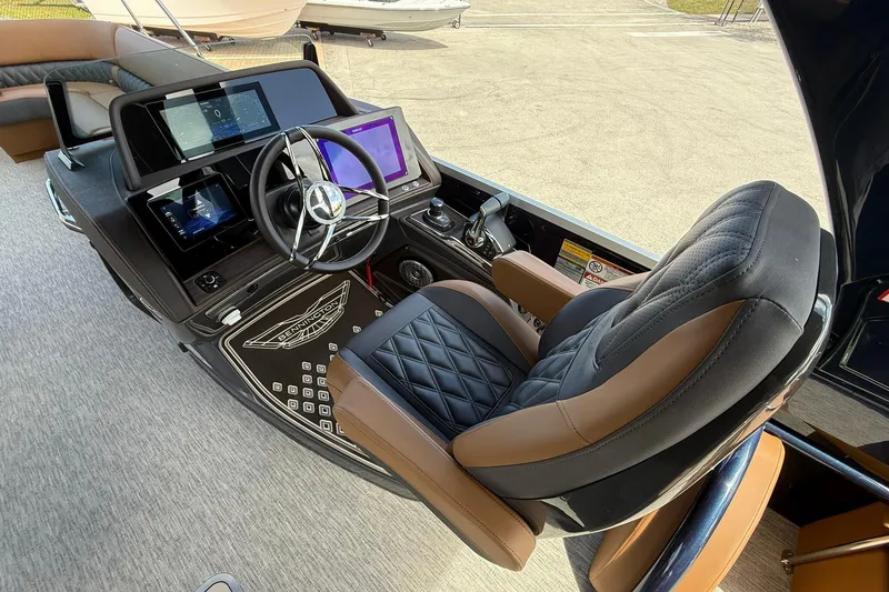Slide: The Image of Luxurious helm of 2026 Bennington QX 30 QXSBA X2 Wide Beam with advanced controls. - 9