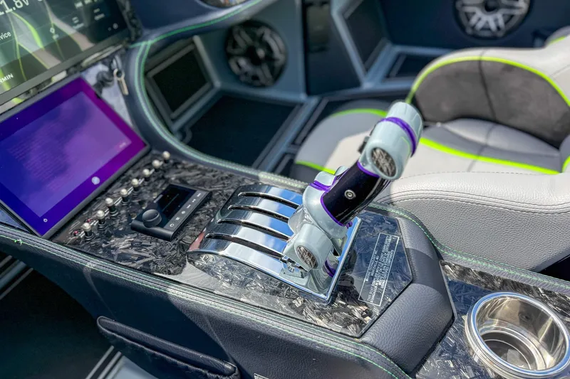 Slide: The Image of 2024 MTI 440X boat interior with advanced controls and touchscreen display. - 13