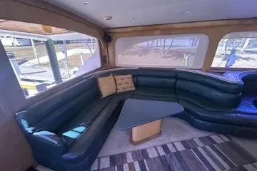 Slide: The Image of Luxurious 1996 Buddy Davis 67 yacht interior with plush seating and modern decor. - 12