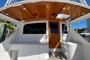 Slide: The Image of 1996 Buddy Davis 67 yacht with wooden ceiling and ladder on deck. - 9