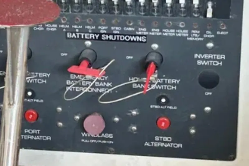 Slide: The Image of Control panel of a 2000 Tiara 37 Open boat with battery shutdown switches. - 100