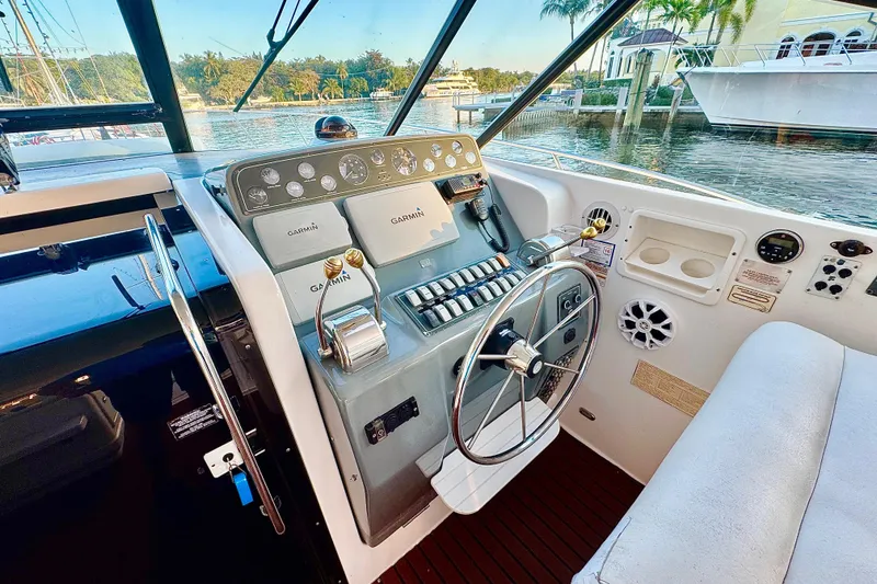 Slide: The Image of Cockpit of 2000 Tiara 37 Open yacht with Garmin navigation system. - 16
