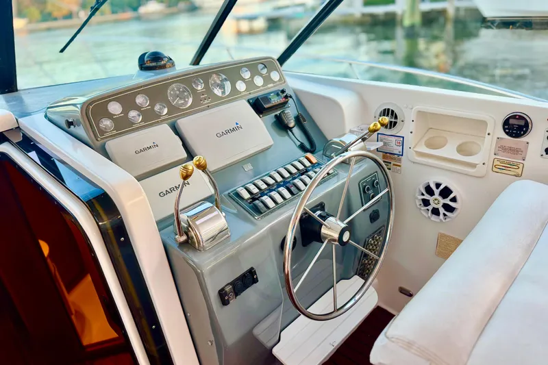 Slide: The Image of Control panel of a 2000 Tiara 37 Open boat with Garmin navigation systems. - 4