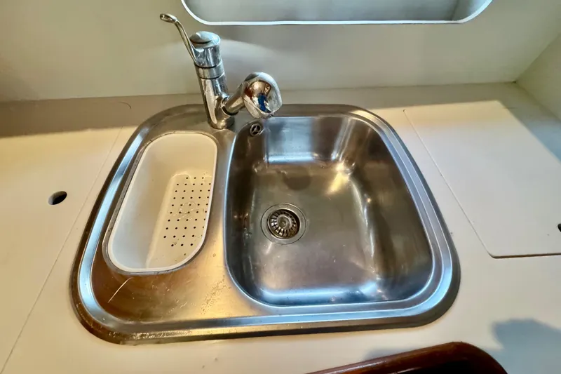 Slide: The Image of Stainless steel sink with faucet in 2000 Tiara 37 Open boat kitchen. - 44