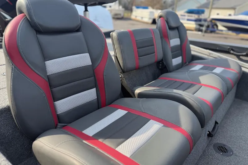 Slide: The Image of 2021 Ranger RT188 boat seats with gray, red, and white upholstery. - 5